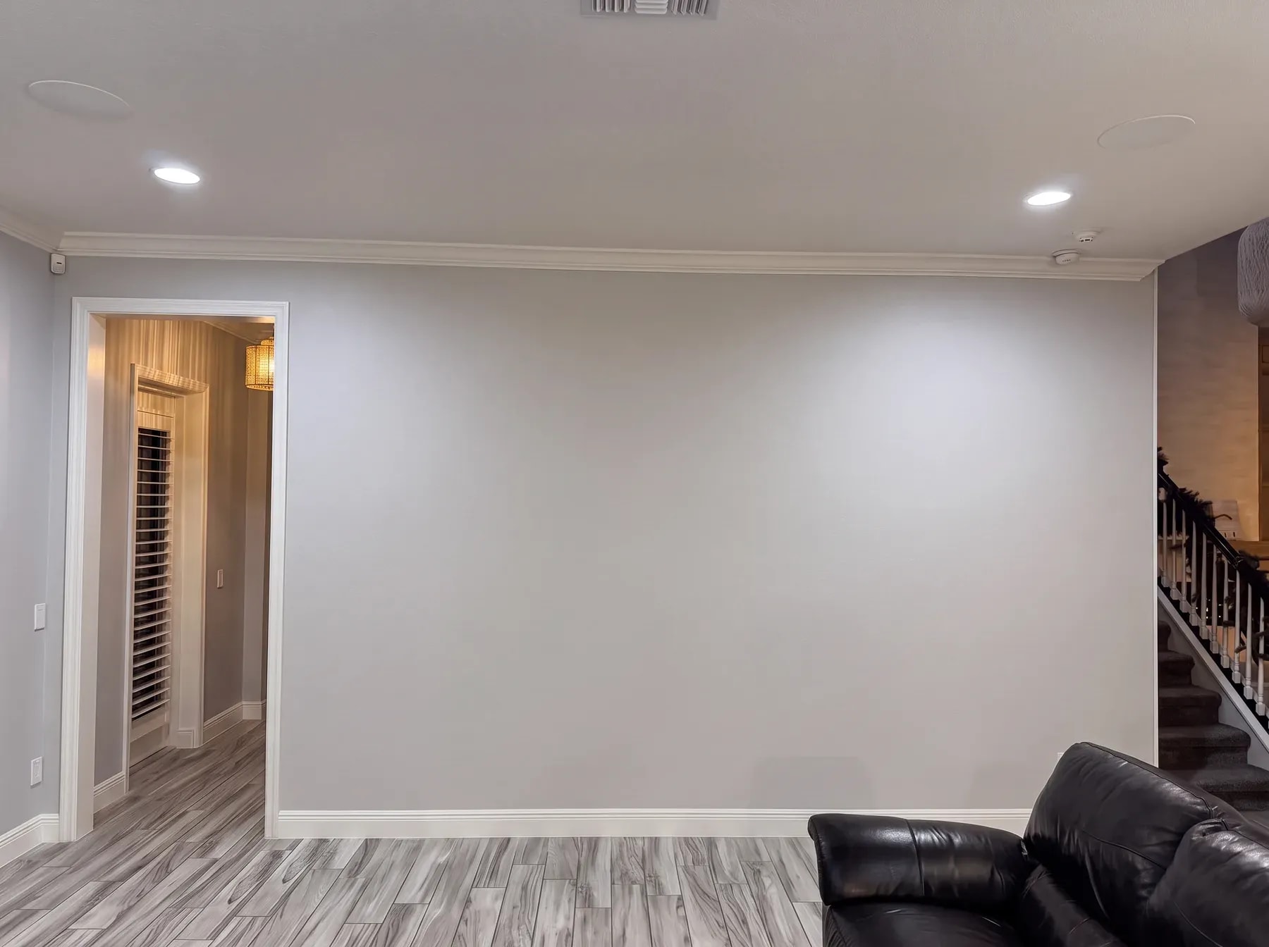 Full-Wall Entertainment Built-In before the installation: the original blank wall