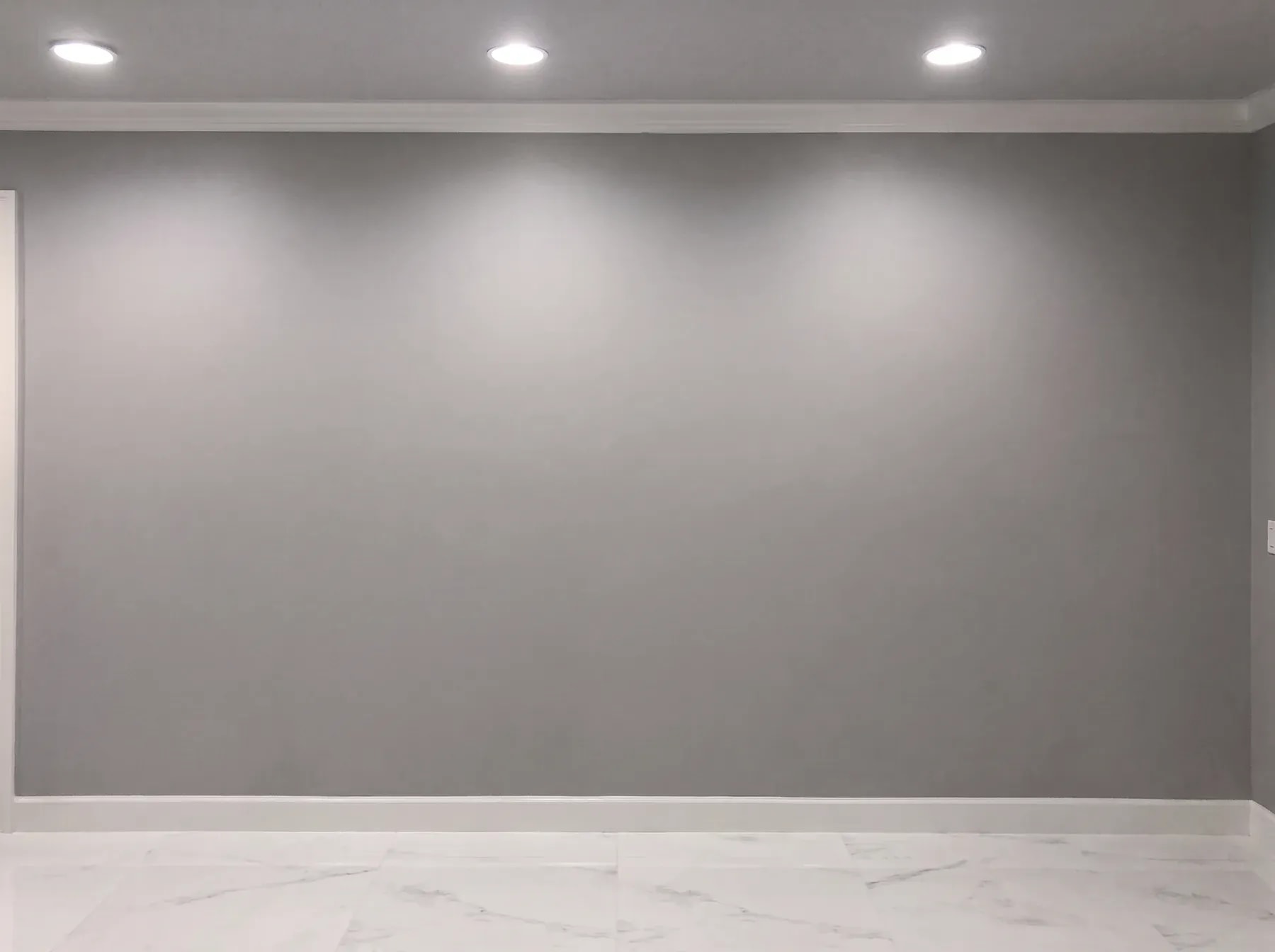 Vertical Tile Wall & Floating Hearth before the installation: the original blank wall